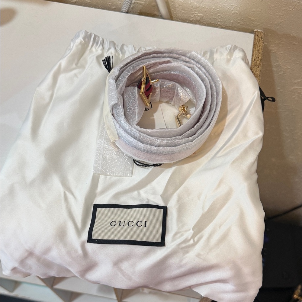 Gucci White strap with Gold and white Accents